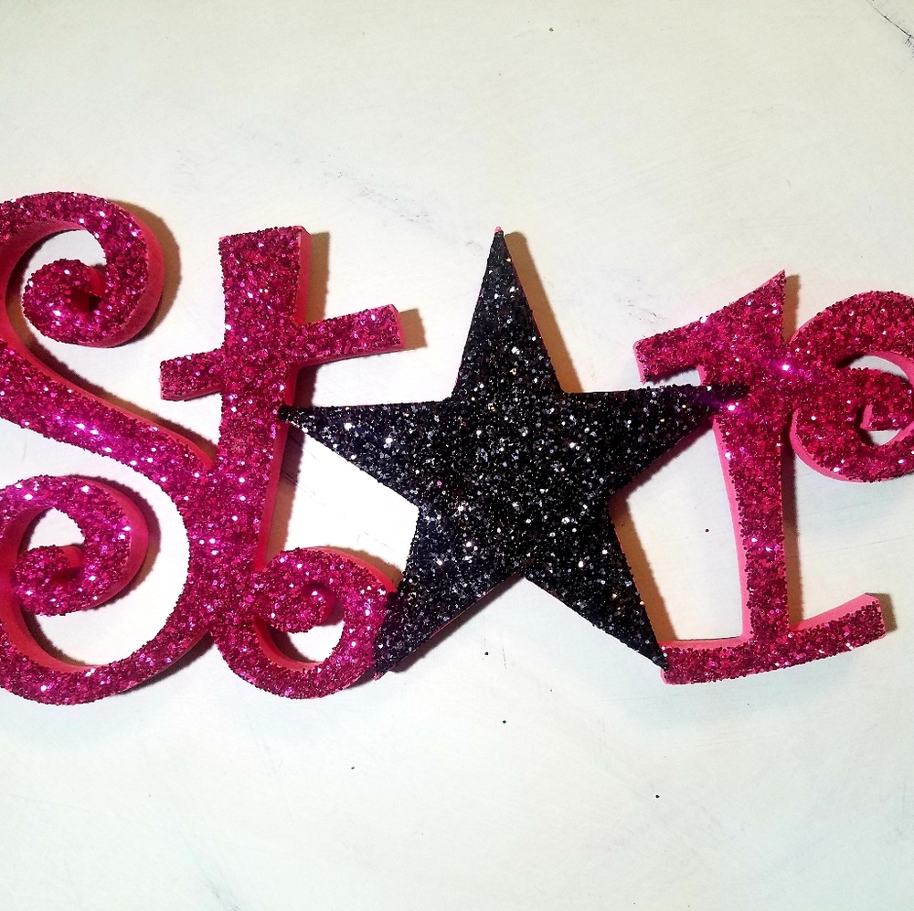Wooden glitter sign that says star hot pink